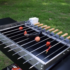 Auto rotating skewer grill and argentine parrilla santa maria grill